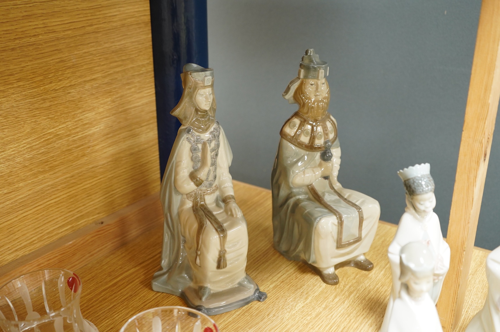 A group of Lladro figures Lord & Lady and a Chancellor, 3 Kings, Joseph with Staff and a recumbent child (8)